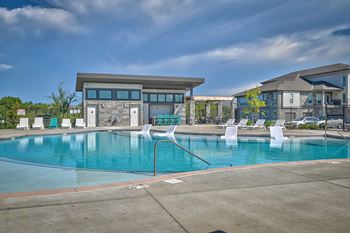 our apartments have a resort style pool with lounge chairs
